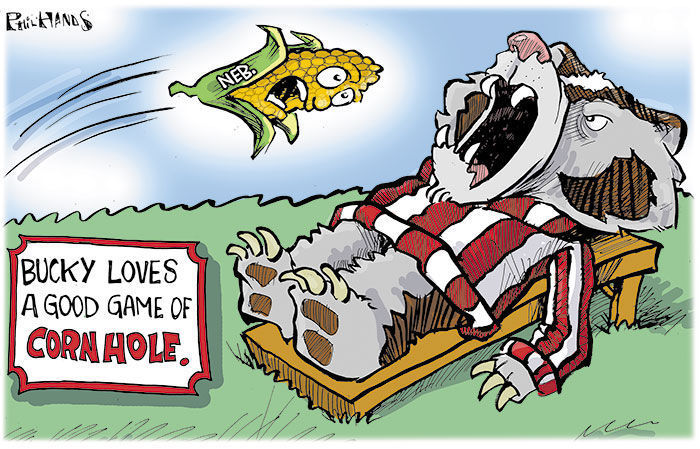 Bucky loves playing cornhole
